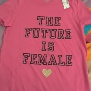 Pink shirt with wording (the future is female)
